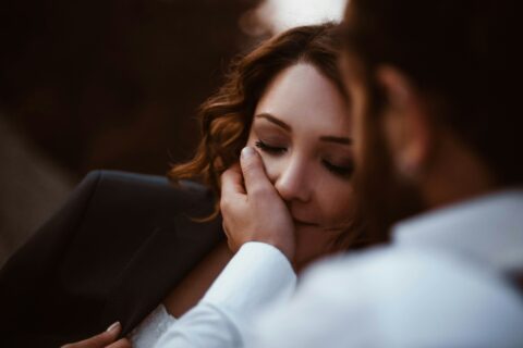 husband holding face of wife