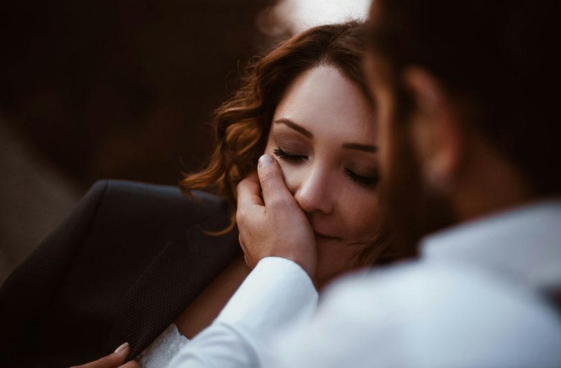 husband holding face of wife