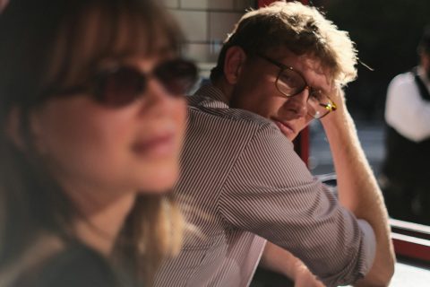 man looks at a woman