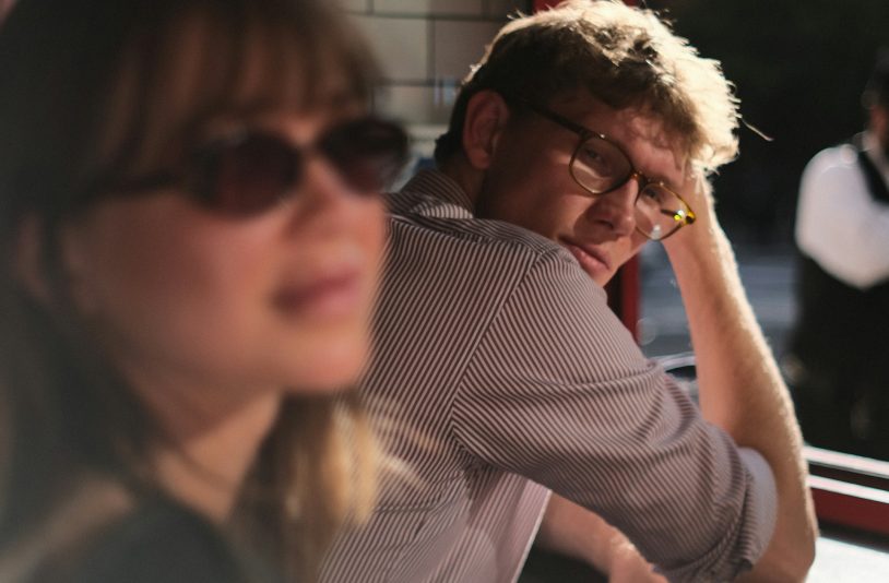 man looks at a woman