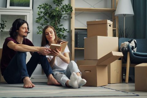 woman and man organize a move