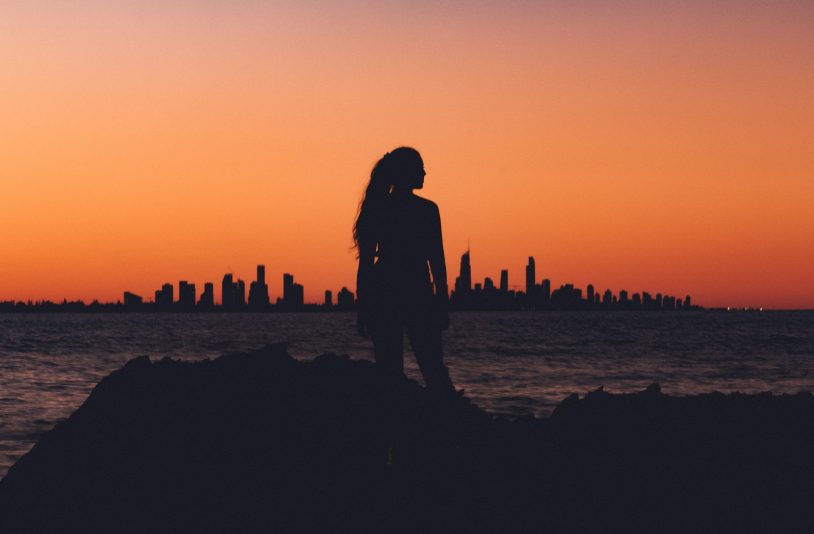 woman looking at buildings