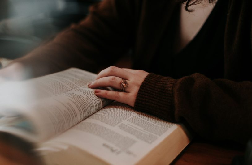 woman reading a bible