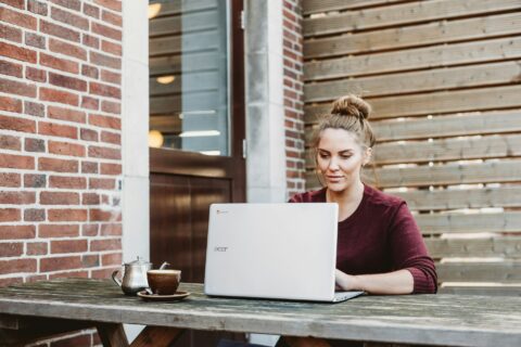 woman using laptop at home